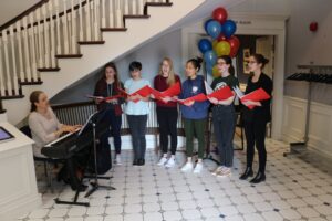 Kids signing the HIVE